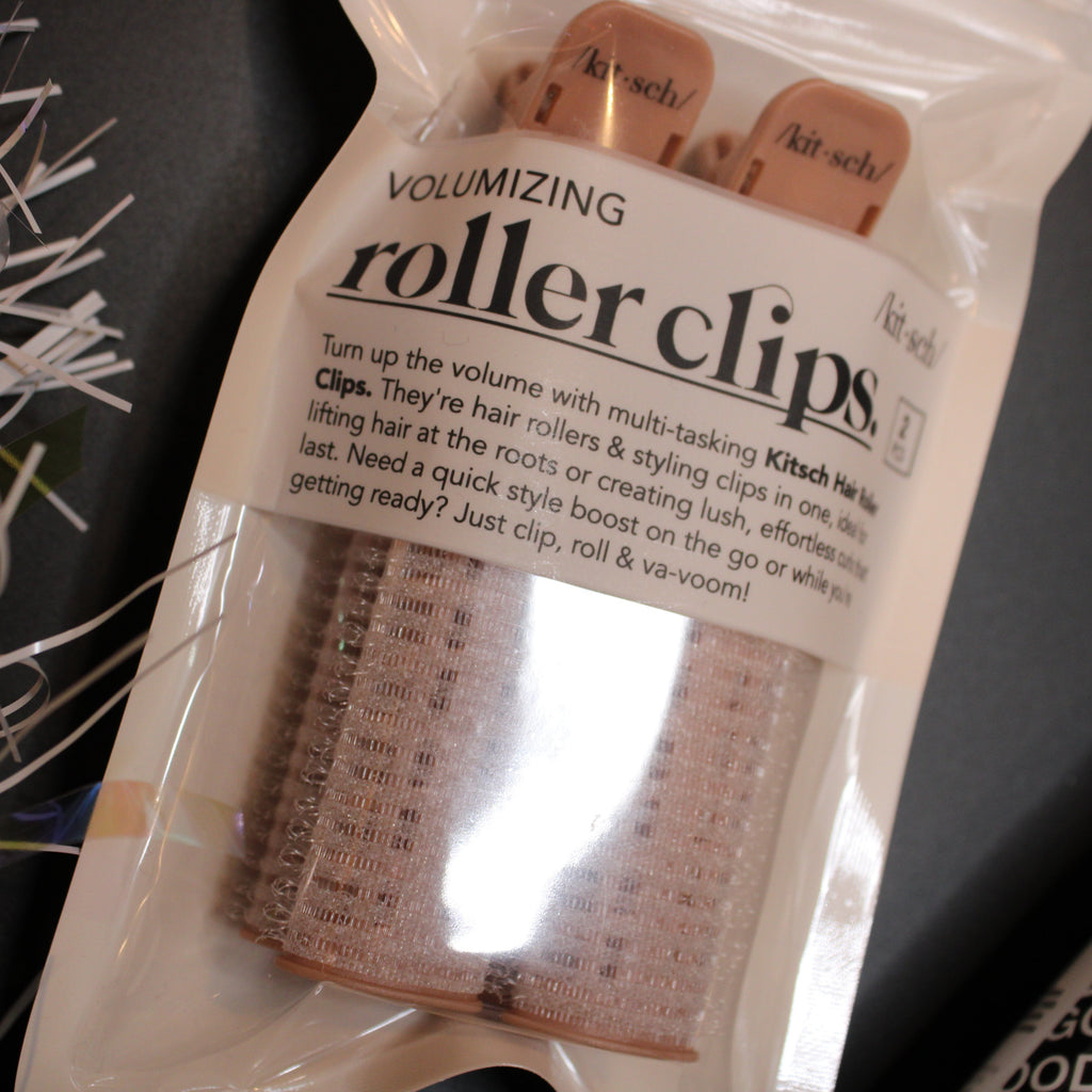 Packaged roller clips with text on a dark background