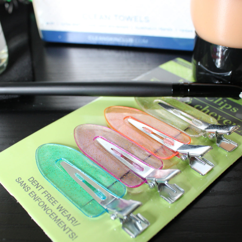 Makeup brush set on a card with a blurred background